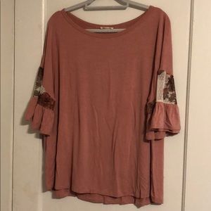 pink blouse with cute flowery sleeves